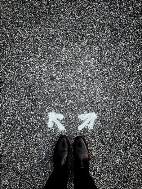 a-person-standing-in-the-middle-of-a-street