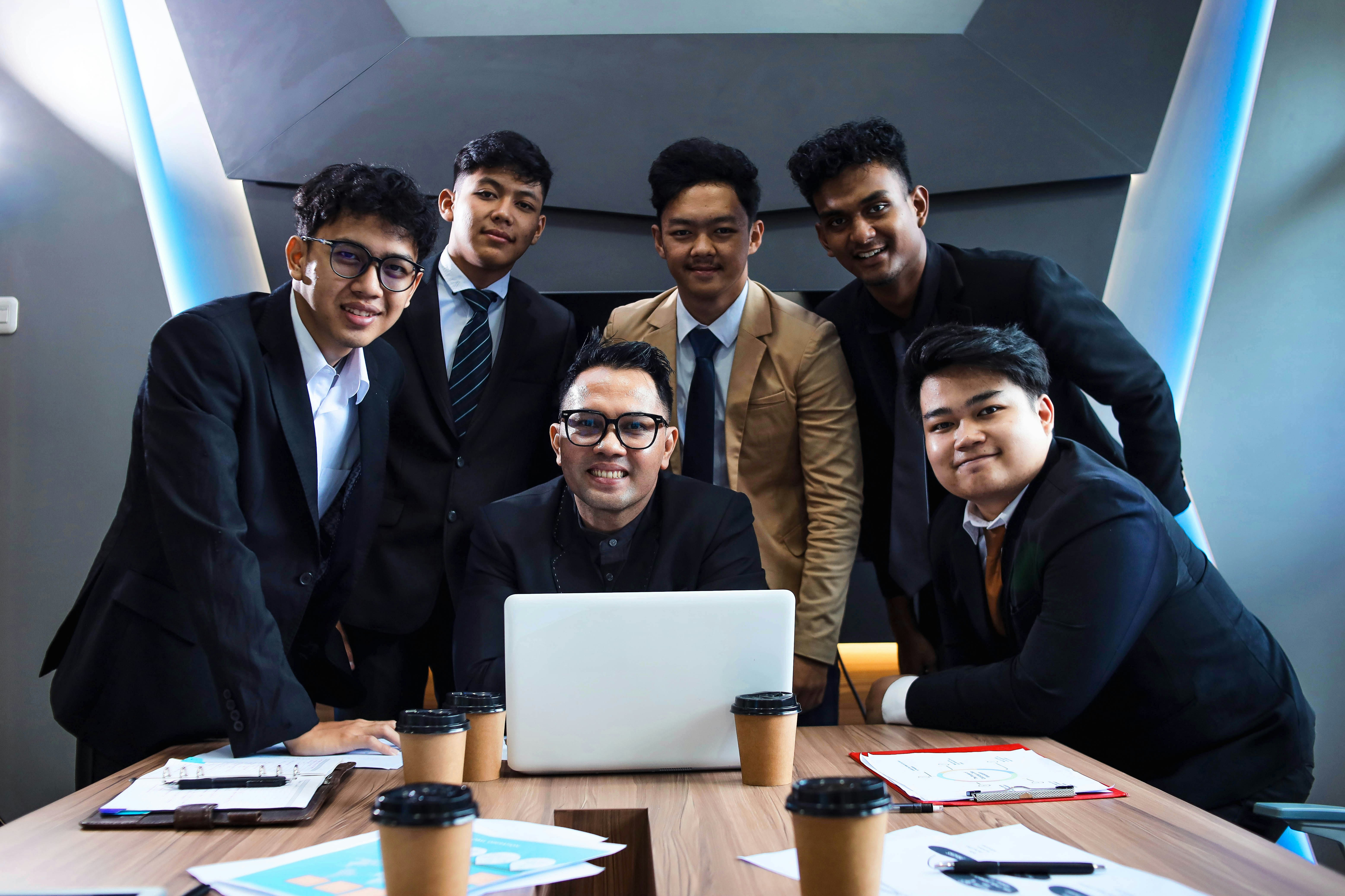 a-team-of-professionals-is-gathered-around-a-table