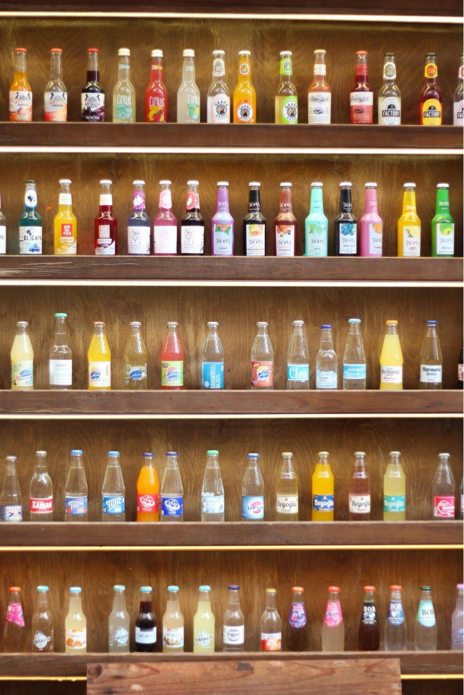 a-wall-with-many-different-types-of-drinks-on-it