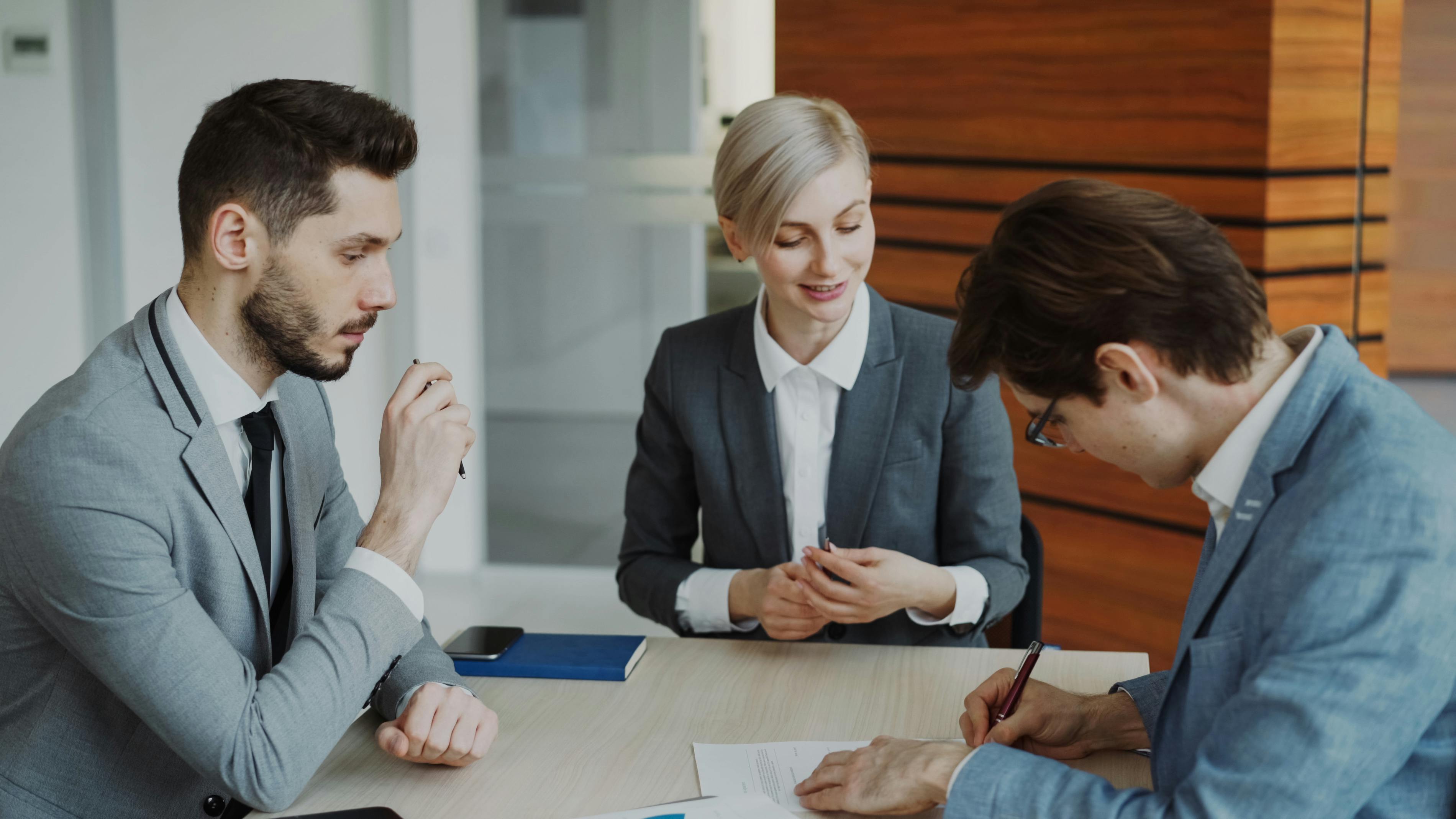 business-team-in-a-meeting-at-office-table