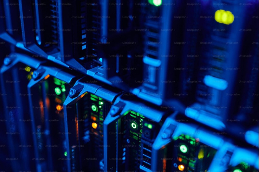 macro-image-of-blade-servers-in-blue-neon-light-stacked-in-data-center-copy-space
