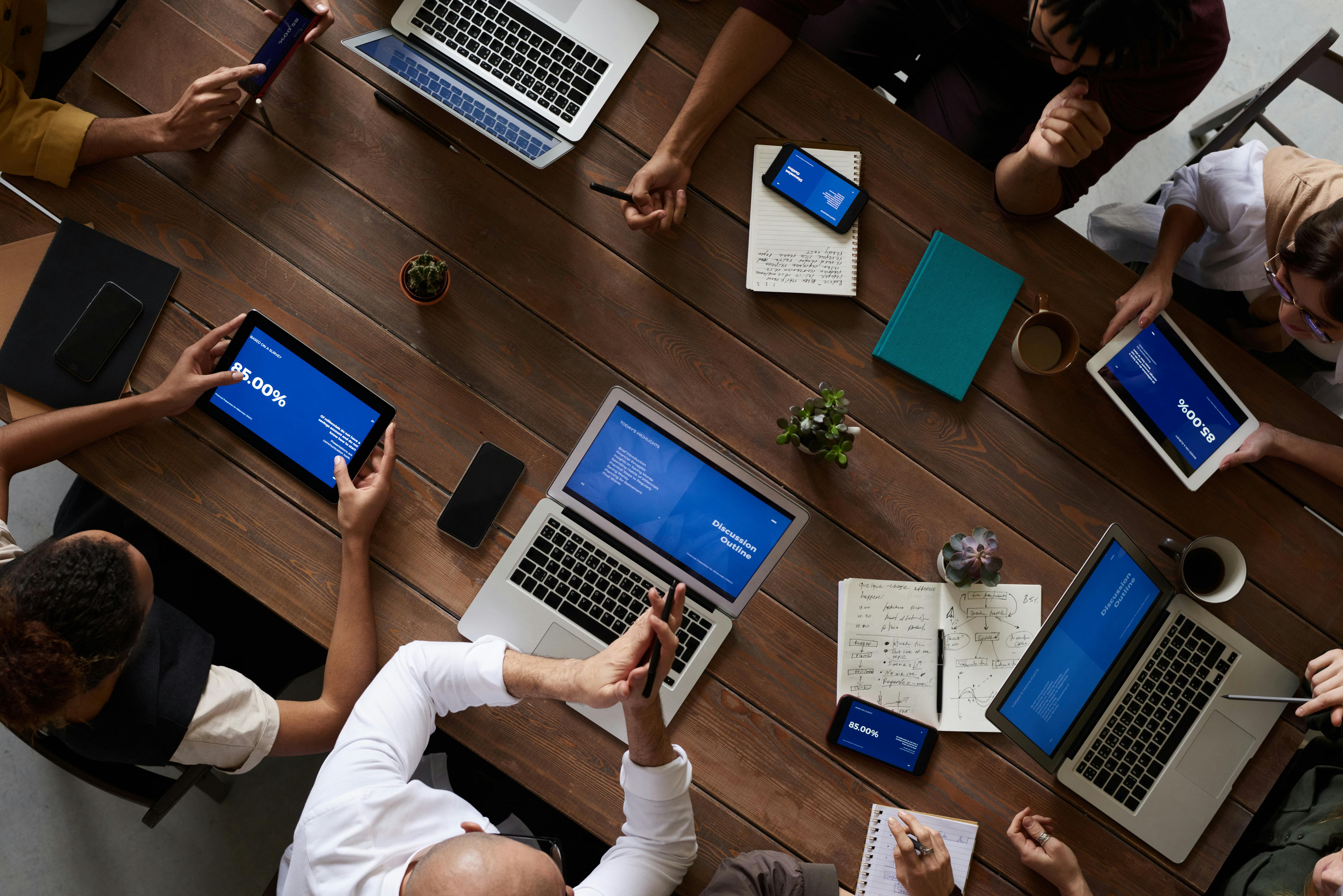 people-at-table-with-laptops