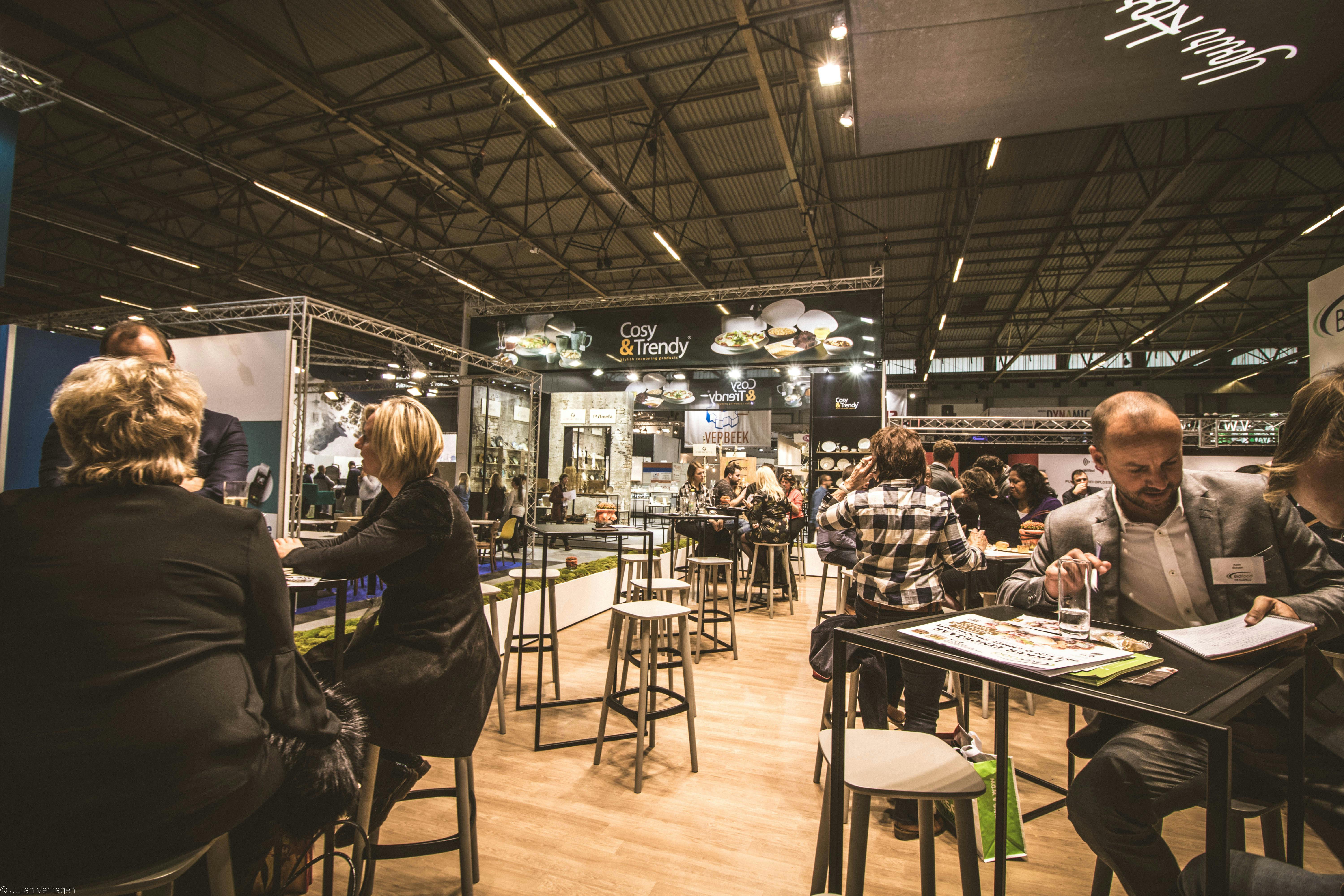 people-inside-a-cafe-with-tables-and-chairs