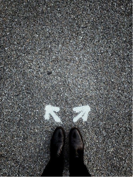 a-person-standing-in-the-middle-of-a-street