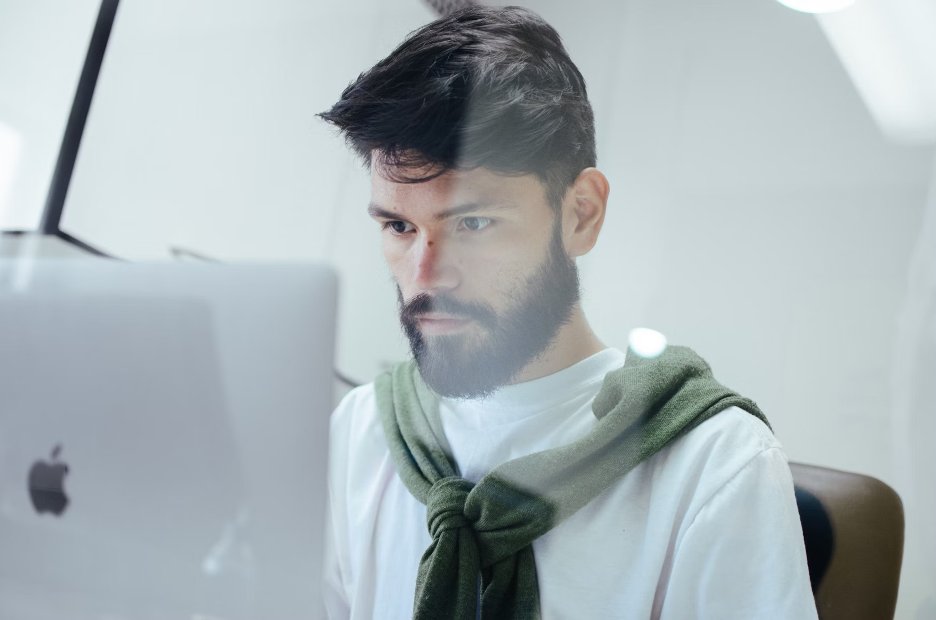 man-facing-macbook-pro