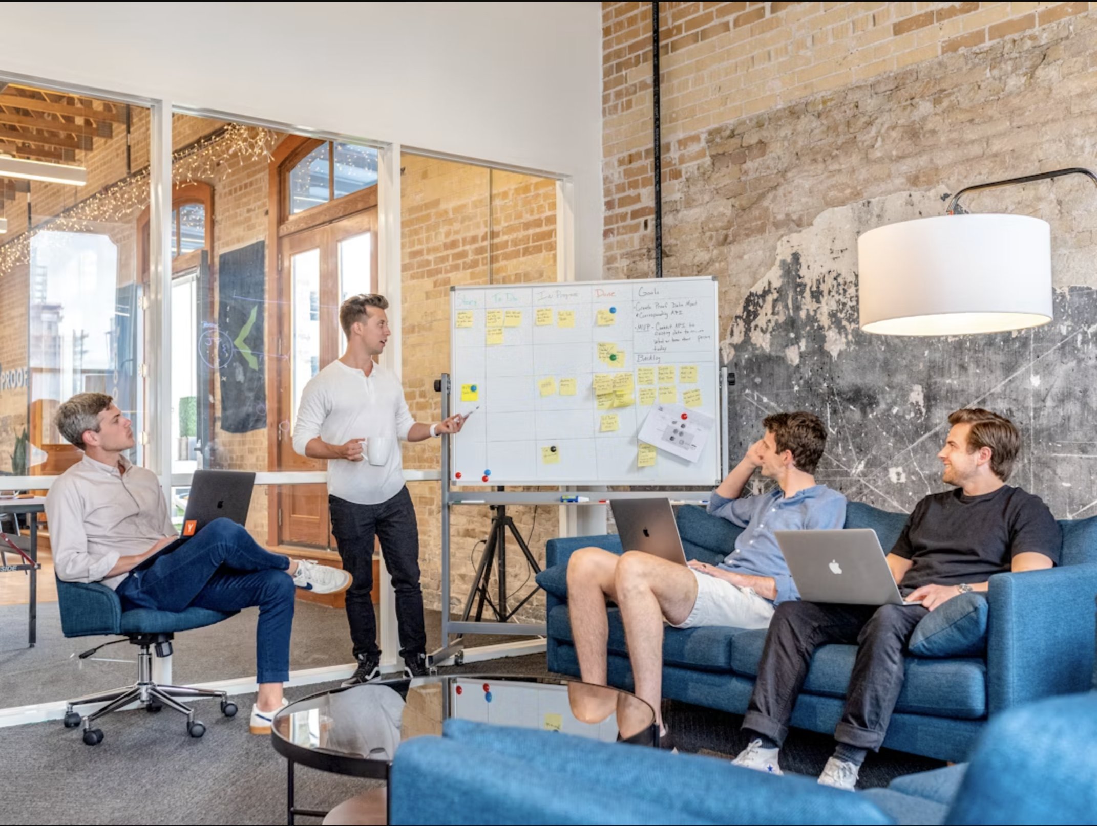 men in office discussing ideas men in office discussing ideas