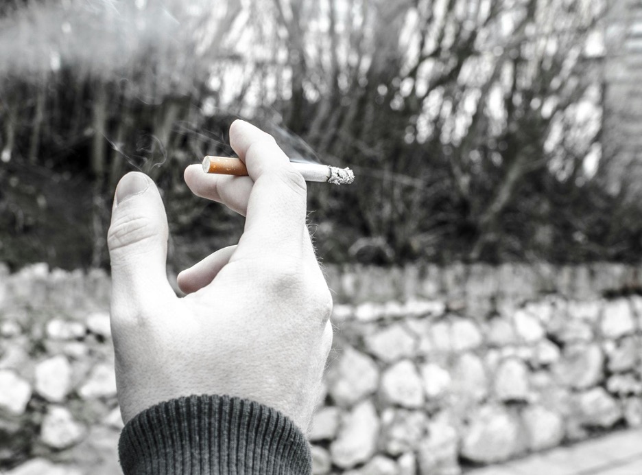 Photo-of-a-hand-holding-a-cigarette
